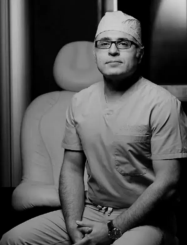 Dr. Kevin Tehrani in surgical scrubs